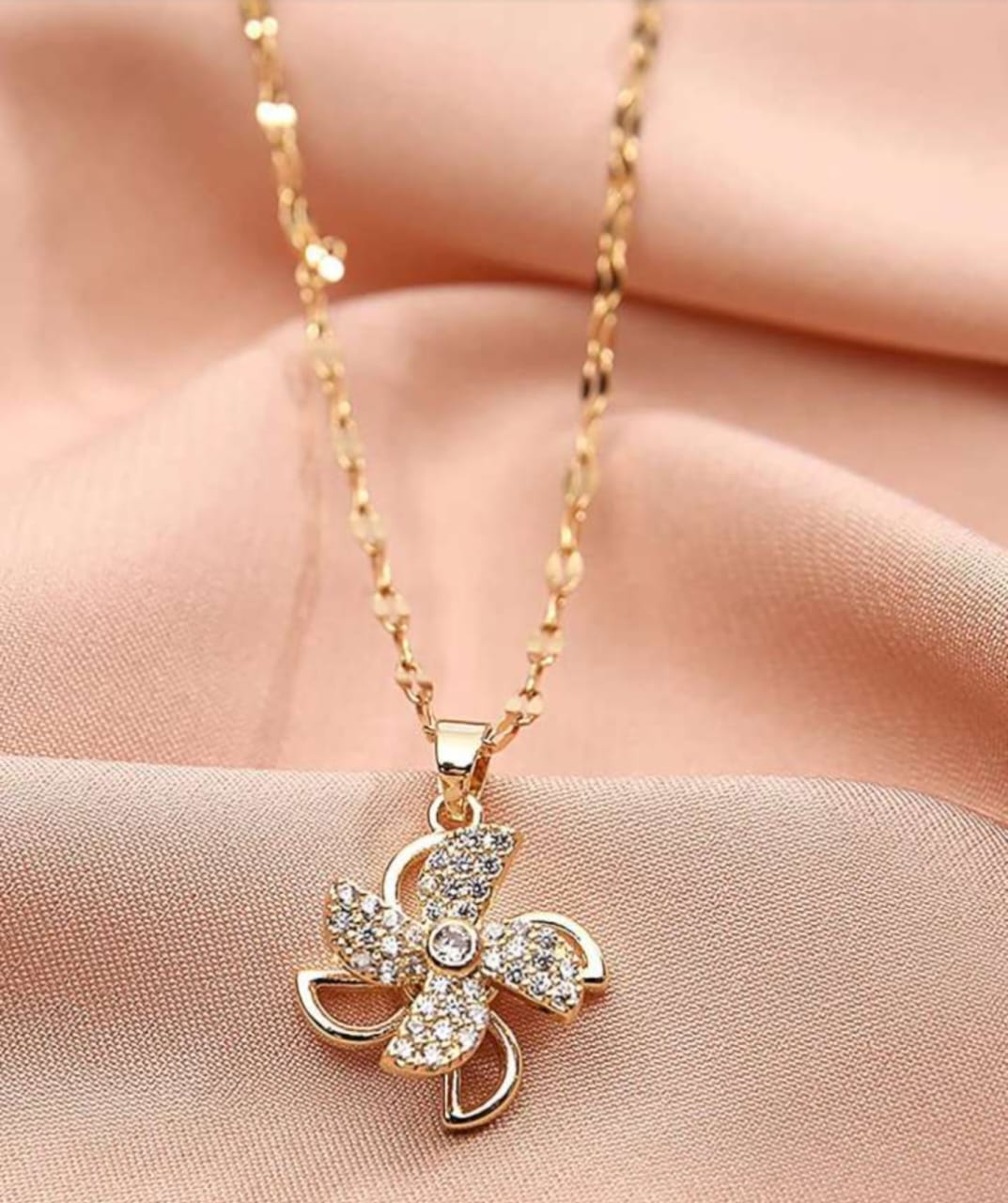 Designer Floral Pendant Necklace – Rotating Ring Detail